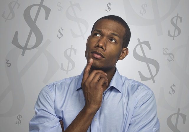 man thinking on how to avoid investment scams
